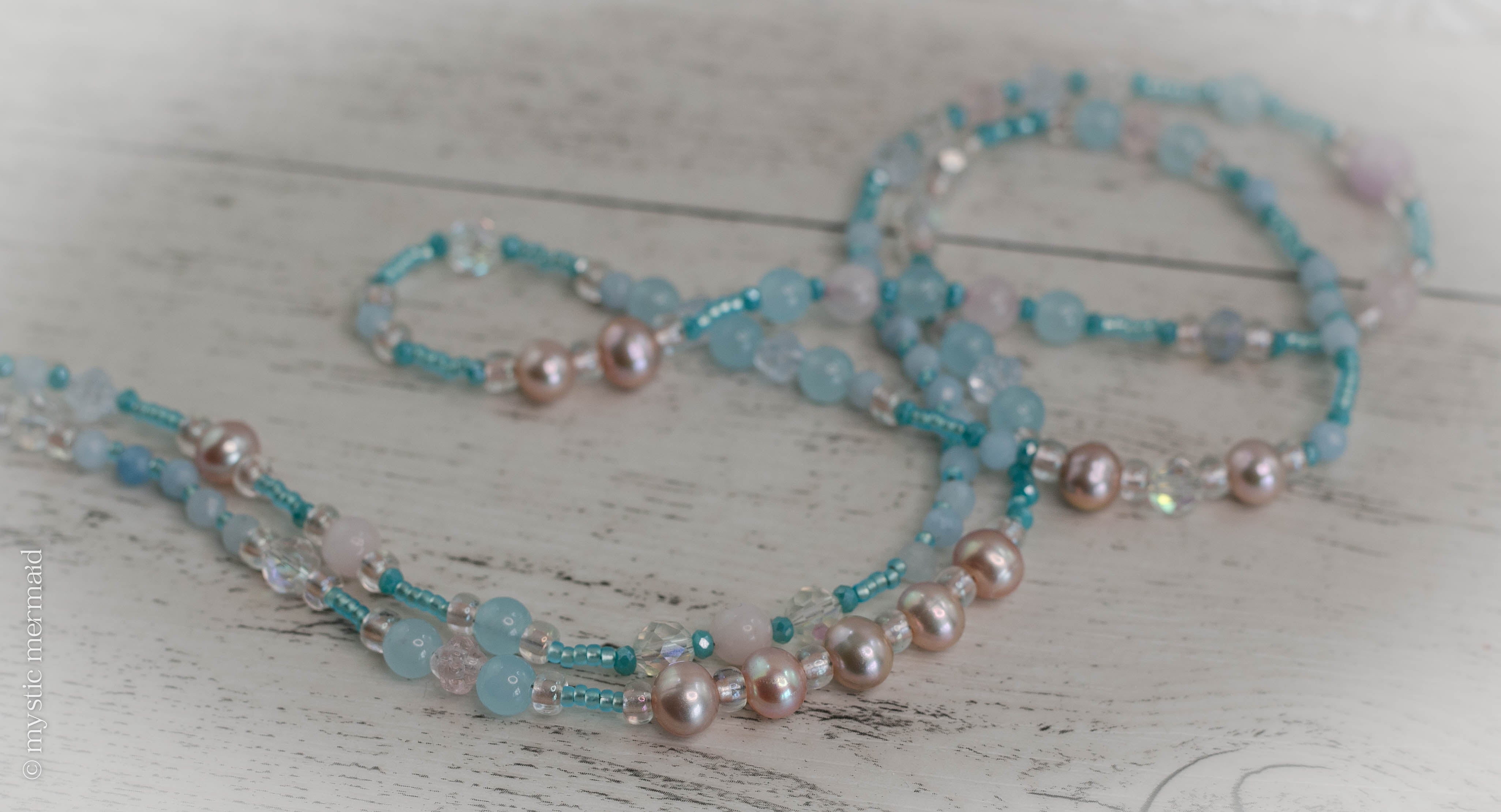 On Wings and Prayers - Angel pendant feature necklace with Aquamarine, Rose Quartz, Genuine Pearls and Kunzite